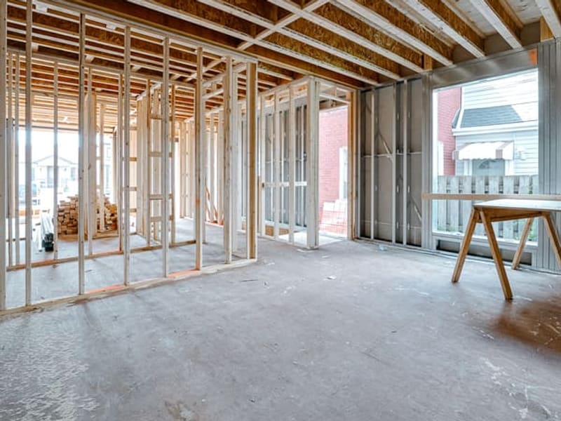 Open concept floor plan with wood and metal stud partition framing and floor joists