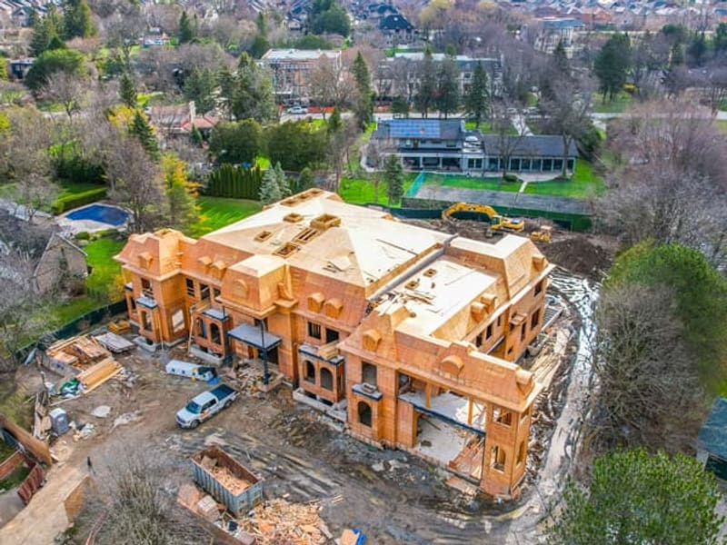 Aerial view of custom estate during framing showing full footprint in Markham neighborhood