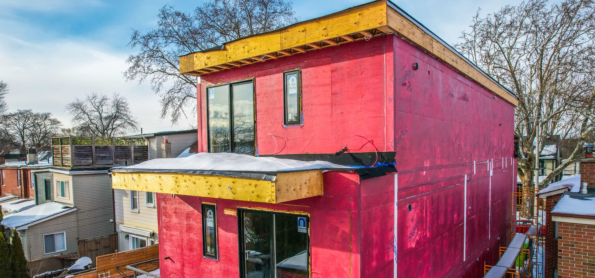 Rear elevation of three-storey multiplex under construction with GlasRoc sheathing at 37 Milverton Blvd