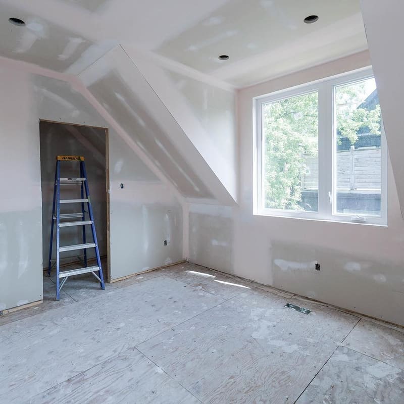 Level 5 drywall finish in custom home with large windows