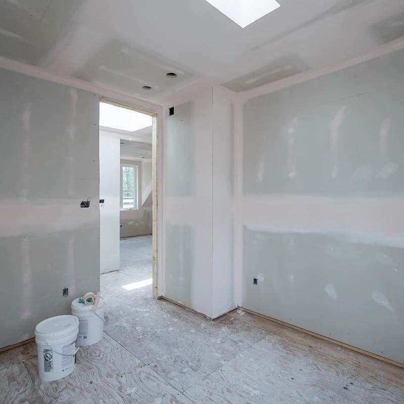 Drywall sanding between coats for smooth finish