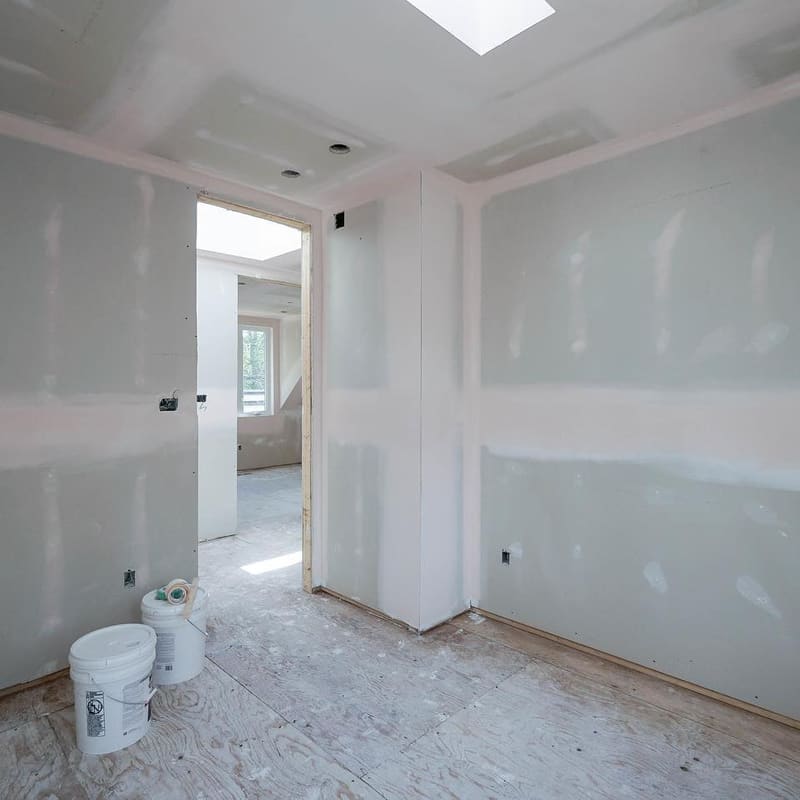Drywall sanding between coats for smooth finish