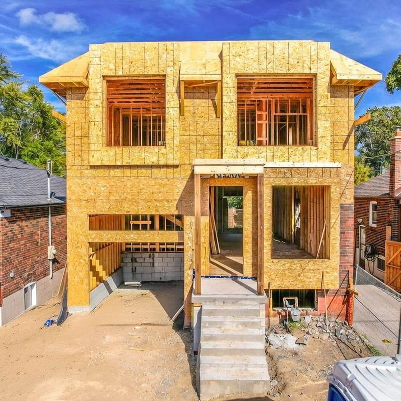 Second storey addition framing on Toronto home with new roof structure