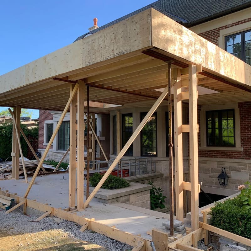 Rear kitchen extension framing tied into existing Toronto house