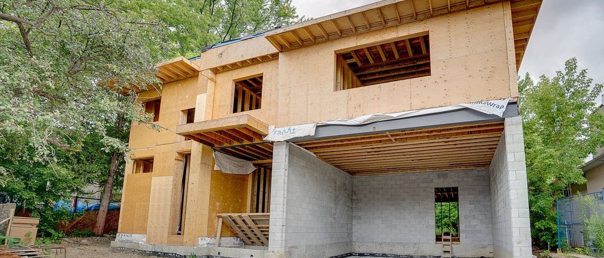 Home addition framing completed and sheathed ready for roofing