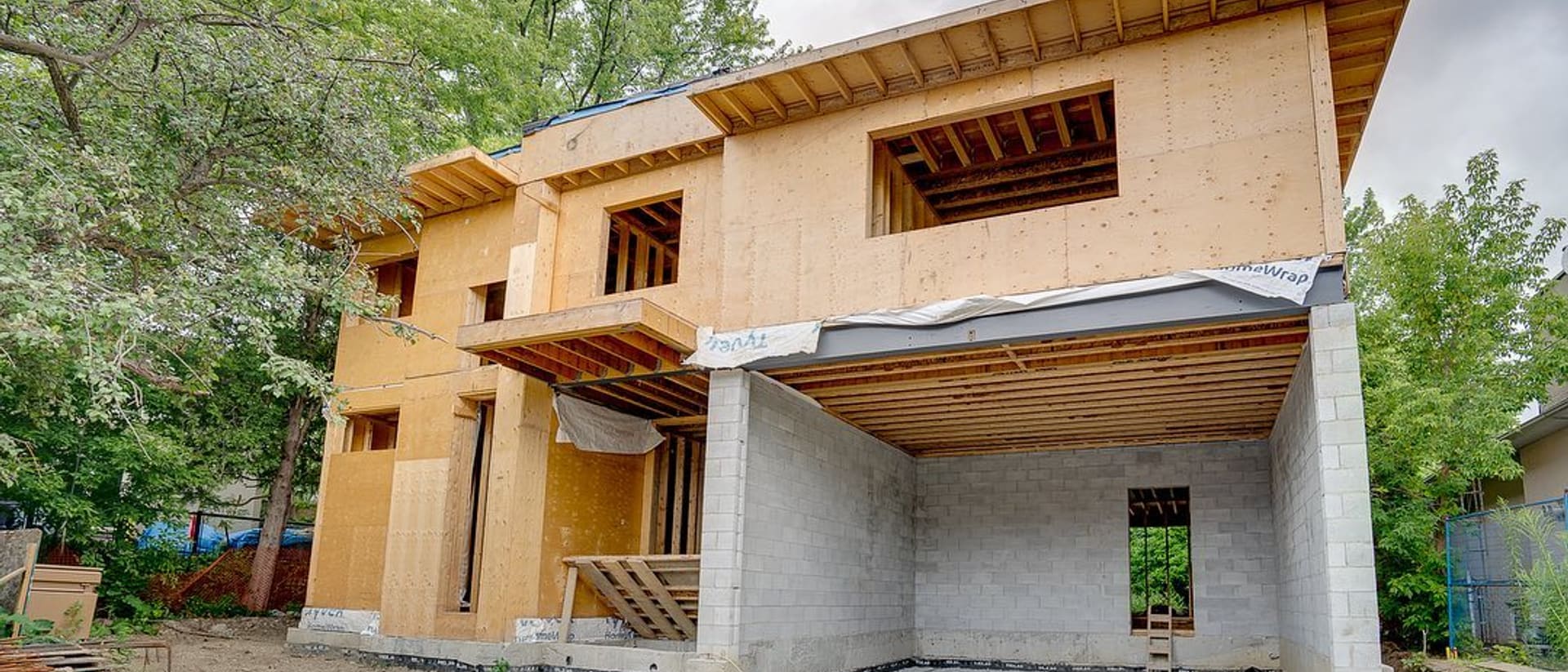 Home addition framing completed and sheathed ready for roofing