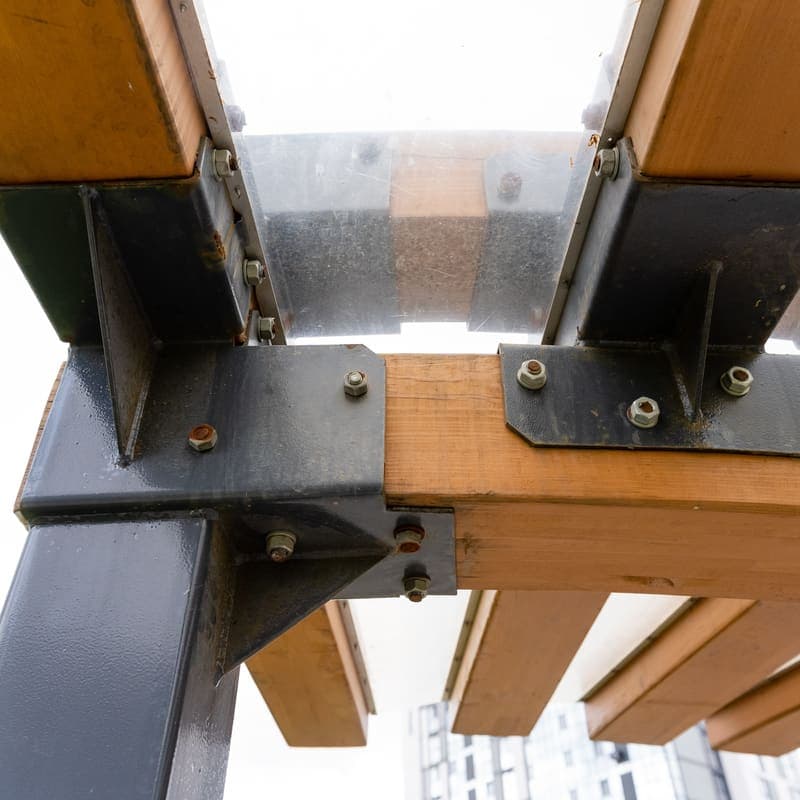 Steel beams being fabricated in shop