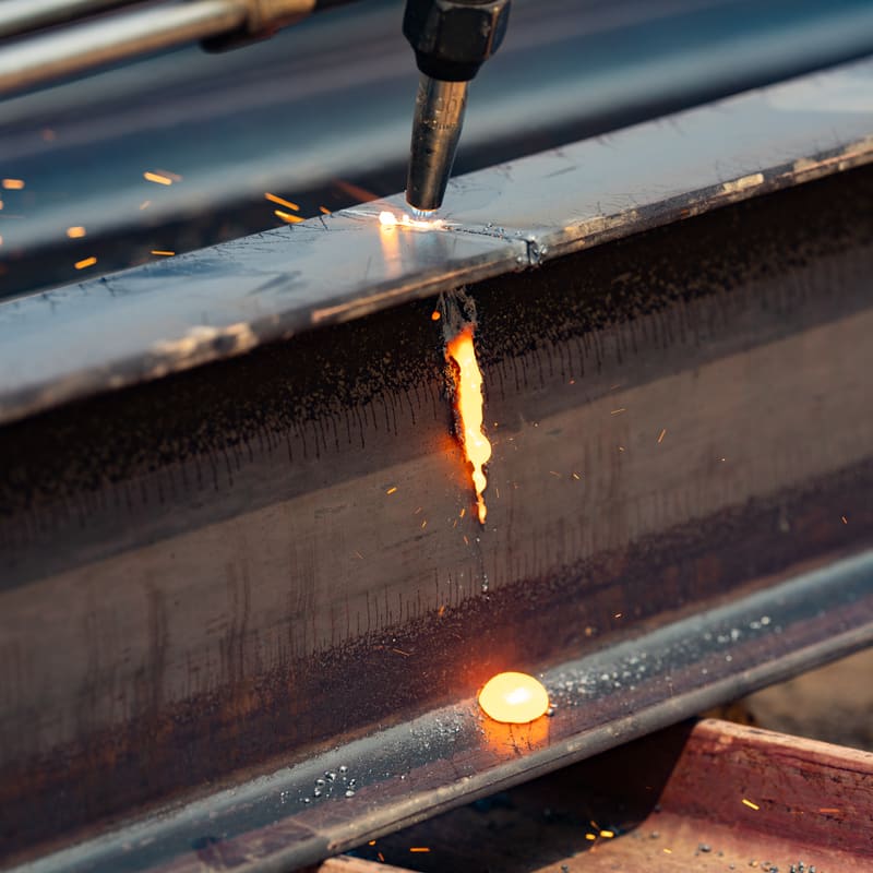 Mobile welder working on structural steel connection